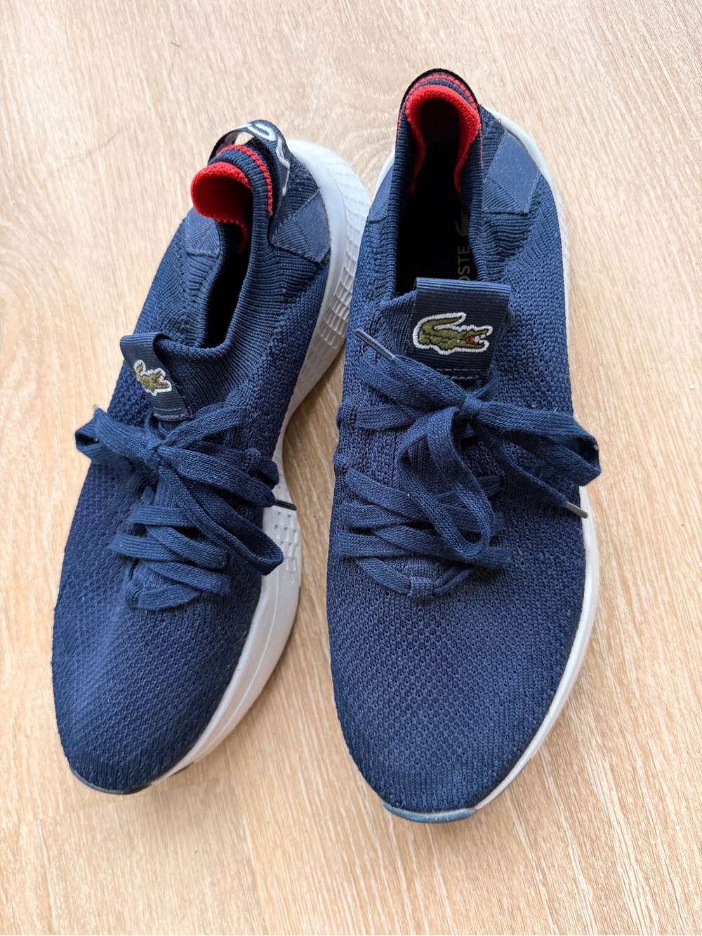 Men’s Lacoste Navy Knit Sneakers with Red Accent and White Sole